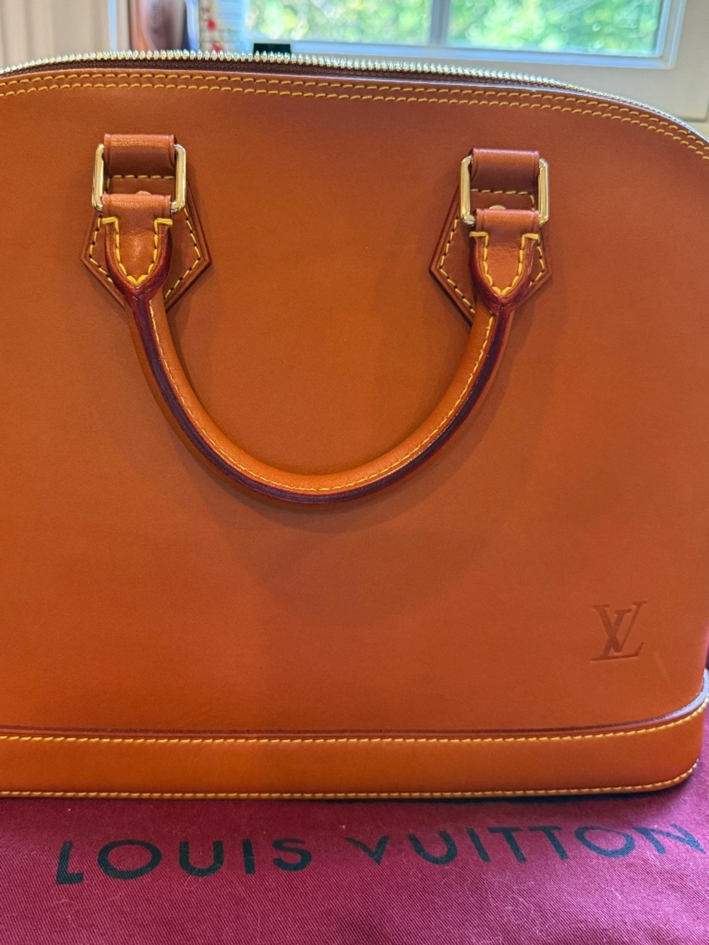 Louis Vuitton Alma PM in Caramel Nomade leather in mint condition
